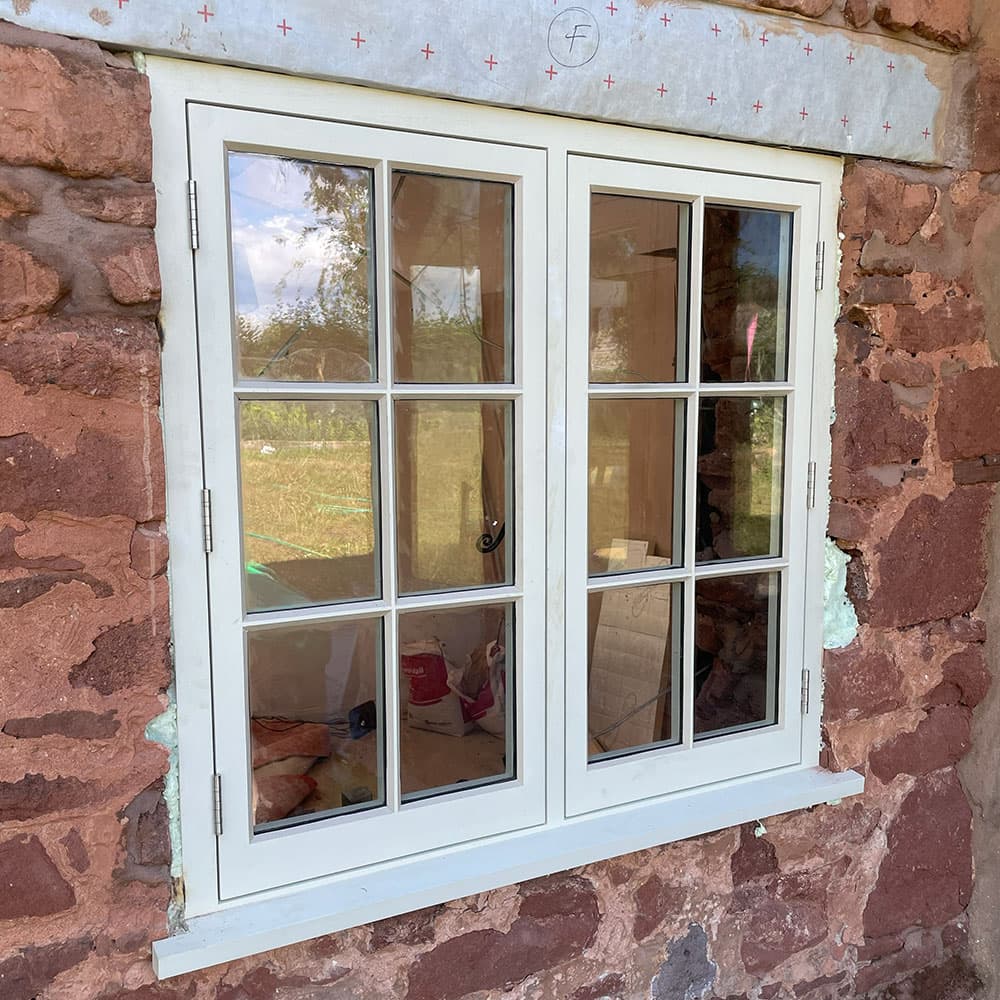 Bespoke timber casement window on a Devon cottage